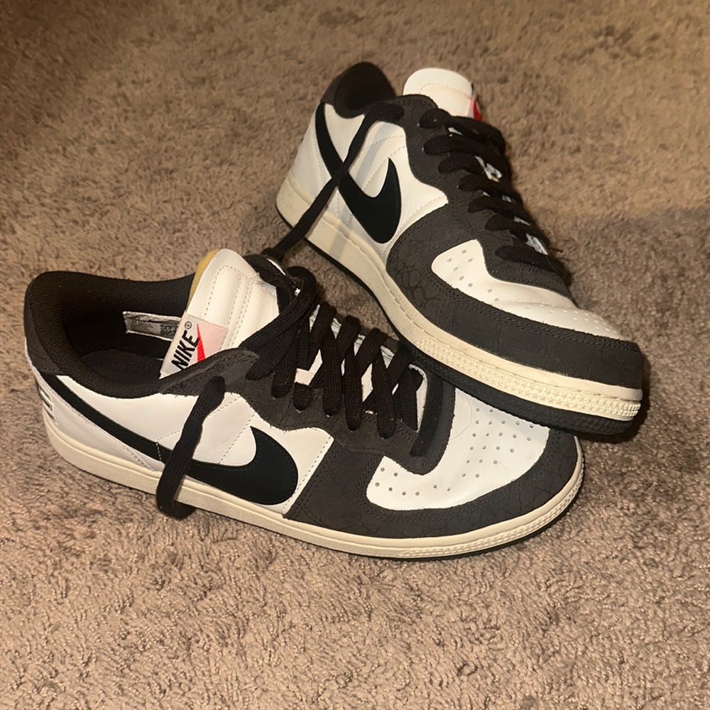 Brown and white Nike sneakers size 10.5